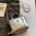 Minimalist silver bucket bag with metallic texture and adjustable shoulder strap - No Pendant / Silver