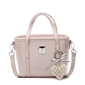 Borsa a secchiello rosa minimalista in pelle lucida con ciondolo cuore di perle e tracolla - Con Pendente a Cuore di Perle / Rosa