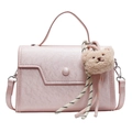 Pink minimalist crossbody bag with faux leather texture and a cute teddy bear charm - Bear Charm With Knot / Pink