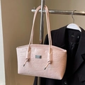 Pink underarm tote bag with cute embossed cartoon patterns and knotted strap handles - Pink
