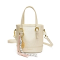 Chic cream white leather bucket bag with gold hardware and woven charm accessory - White