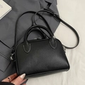 Classic black litchi grain Boston handbag with silver zippers and adjustable strap - No Pendant / Black