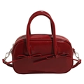 Bolso Boston de charol rojo con decoración de doble lazo y asas superiores - Burdeos