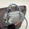 Light blue lychee texture boston bag with top handles and a rocking horse charm - Light Blue + PU Horse