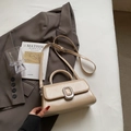 Elegant beige square handbag with adjustable strap and metallic clasp closure - Khaki