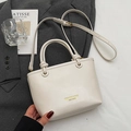Chic beige bucket bag with top handle and adjustable shoulder strap for women - No Pendant / Off White