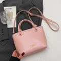 Pink minimalist faux leather bucket bag with top handles and adjustable crossbody strap - No Pendant / Pink
