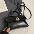 Minimalistische schwarze Handtasche aus Ölleder mit silbernem Hufeisenverschluss - Schwarz - Ohne Anhänger