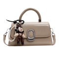 Beige minimalist top-handle square bag with silver oval clasp and pearl doll charm - Khaki With Cartoon Pendant