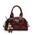 Deep red Boston bag in glossy leather with cartoon charm and pearl chain accent - With Doll Keychain / Red