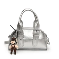 Chic silver Boston handbag with glossy finish and cute cartoon charm accessory - With Doll Keychain / Silver