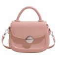 Light pink oil wax leather saddle bag with silver buckle and top handle - Pink