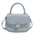 Minimalist light blue oil wax leather saddle bag with silver metallic clasp - Blue