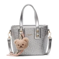 Silver woven bucket bag with metallic finish and brown teddy bear charm accessory - With Bear Pendant / Silver