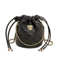 Chic black quilted bucket bag with gold puppy emblem and leather chain strap - Black