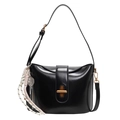 Elegant black glossy faux leather shoulder bag with golden clasp and tassel detail - Black With Pendant