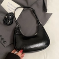 Minimalist black oil wax leather hobo bag with adjustable strap and silver logo detail - No Pendant / Black