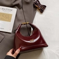 Elegant wine red oil wax leather dumpling bag with golden metal logo and adjustable strap - Red - No Pendant