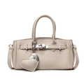 Elegant beige lychee texture leather handbag with silver lock and heart charm accessory - Beige