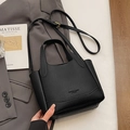 Borsa a secchiello nera minimalista trama litchi con manici e tracolla regolabile - Senza Ciondolo / Nero
