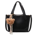 Chic black litchi grain tote bag for women featuring a cute brown plush bear pendant - Bear Charm With Knot / Black