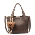 Deep brown lychee texture bucket bag with a cute plush bear charm and crossbody strap - Bear Charm With Knot / Elephant Gray