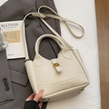 Chic beige lychee textured bucket bag with gold lock and adjustable crossbody strap - No Pendant / Off White