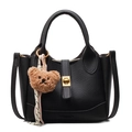 Black litchi grain bucket bag with gold twist lock and brown plush bear charm - Bear Charm With Knot / Black