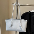 Light blue minimalist PU shoulder tote bag with embossed logo and knotted strap detail - No Pendant / Blue