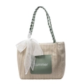 Beige woven straw tote with green handles, summer text detail and white lace bow - Green