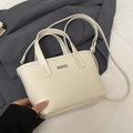 Chic cream white bucket bag with smooth leather finish and minimalist silver hardware - No Pendant / Off White
