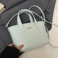 Minimalist light blue bucket bag with short handles and adjustable shoulder strap - No Pendant / Blue