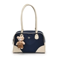 Retro-Schultertasche aus blauem Nylon mit cremefarbenem Lederbesatz und Bärenanhänger - Mit Bärenanhänger / Blau