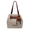 Bolso tote de lona blanco roto con bolsillo en forma de hueso y dije de osito - Gris Arroz + Llavero de Perro