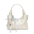 Elegant off-white wax leather handbag with pearl chain and bow charm detail - White