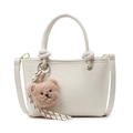 White woven bucket bag for women featuring a plush bear charm and crossbody strap - Creamy White + Bear Charm