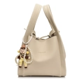 Beige lychee pattern bucket bag with pearl charm and fashion lettering detail - Yellow Girl Pendant / White