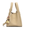 Chic beige lychee textured bucket bag with pearl chain and cartoon charm accessory - Yellow Girl Pendant / Apricot