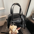 Glossy black oil wax leather pillow bag with top handles and cute bear charm - Black With Bear Charm