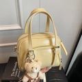 Chic cream yellow oil wax leather pillow bag with cute teddy bear charm accessory - Yellow With Bear Charm