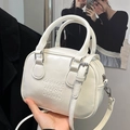 Cream white mini bowling bag with embossed lettering and detachable shoulder strap - White without Pendant