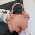 Pink vintage oil-wax leather bucket bag with metal logo and knotted handle detail - Pink - No Pendant