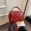 Chic red quilted crossbody bag with golden metal logo and adjustable leather strap - Red