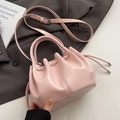 Pale pink drawstring bucket bag with shiny faux leather texture and dual handles - Pink - No Pendant