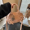 Pink Boston bowling bag with side ribbon bow and silver bead charm in mirror view - With Pendant / Pink