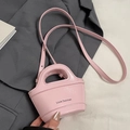 Pink glossy wrinkled leather mini handbag with top handle and crossbody shoulder strap - No Pendant / Pink