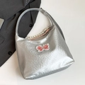 Silver metallic hobo tote bag with pink lace bow and adjustable shoulder strap - Silver With Pendant