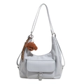 Light blue glossy hobo tote bag with silver buckle and cute brown puppy plush charm - Blue With Plush Dog Pendant