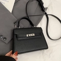 Classic black litchi texture leather Kelly handbag with silver hardware and shoulder strap - No Pendant / Black