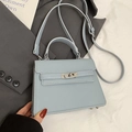 Elegant light blue litchi pattern trapezoid handbag with top handle and crossbody strap - No Pendant / Blue